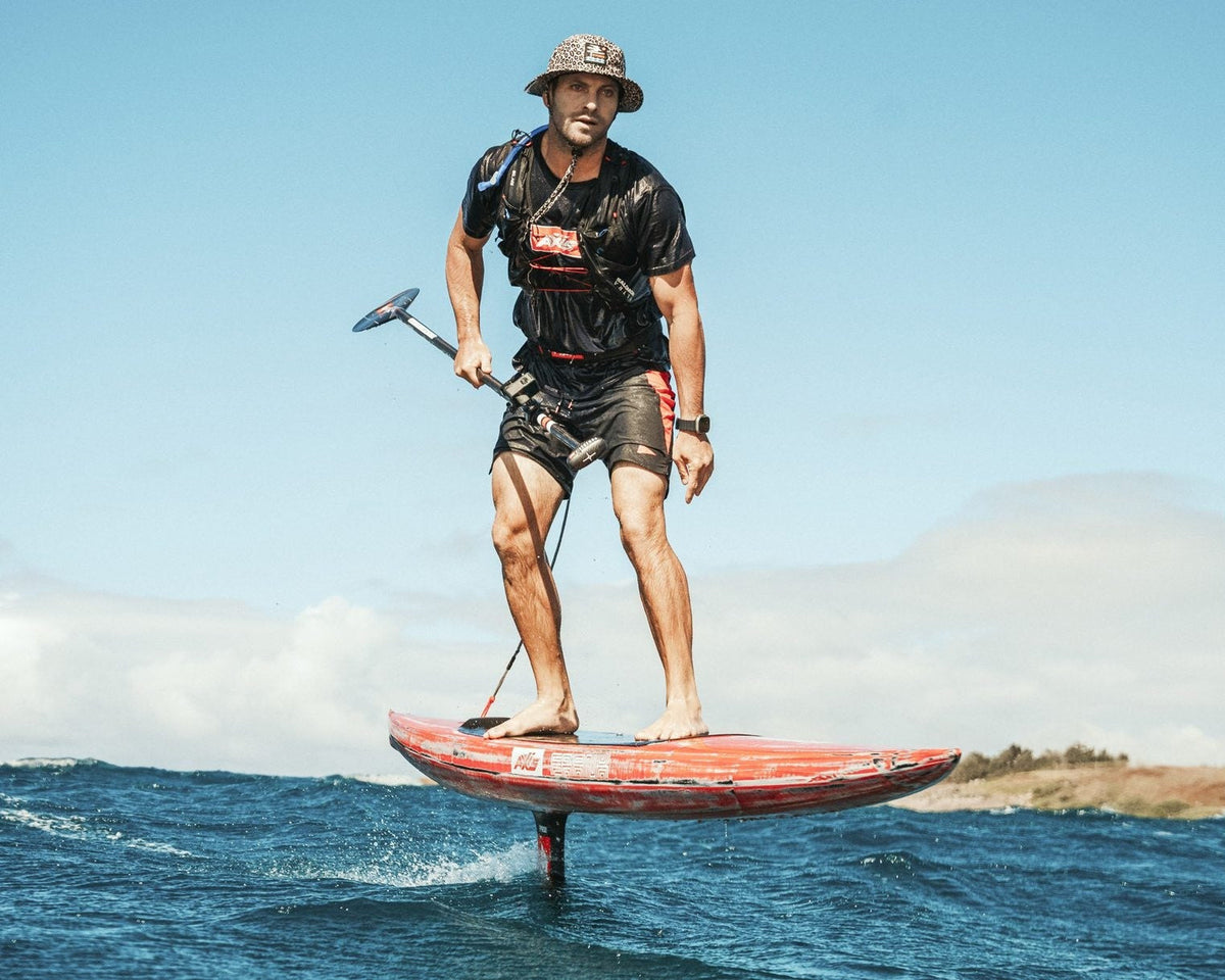 SUP foiling with a paddle